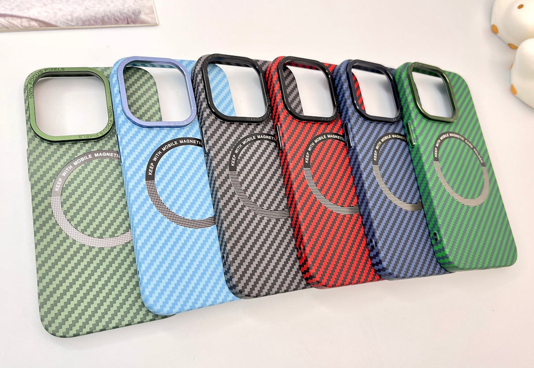 a group of four cell phones sitting on top of a table